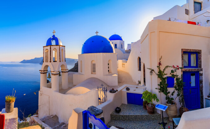 A view of the blue domed church in santorini.